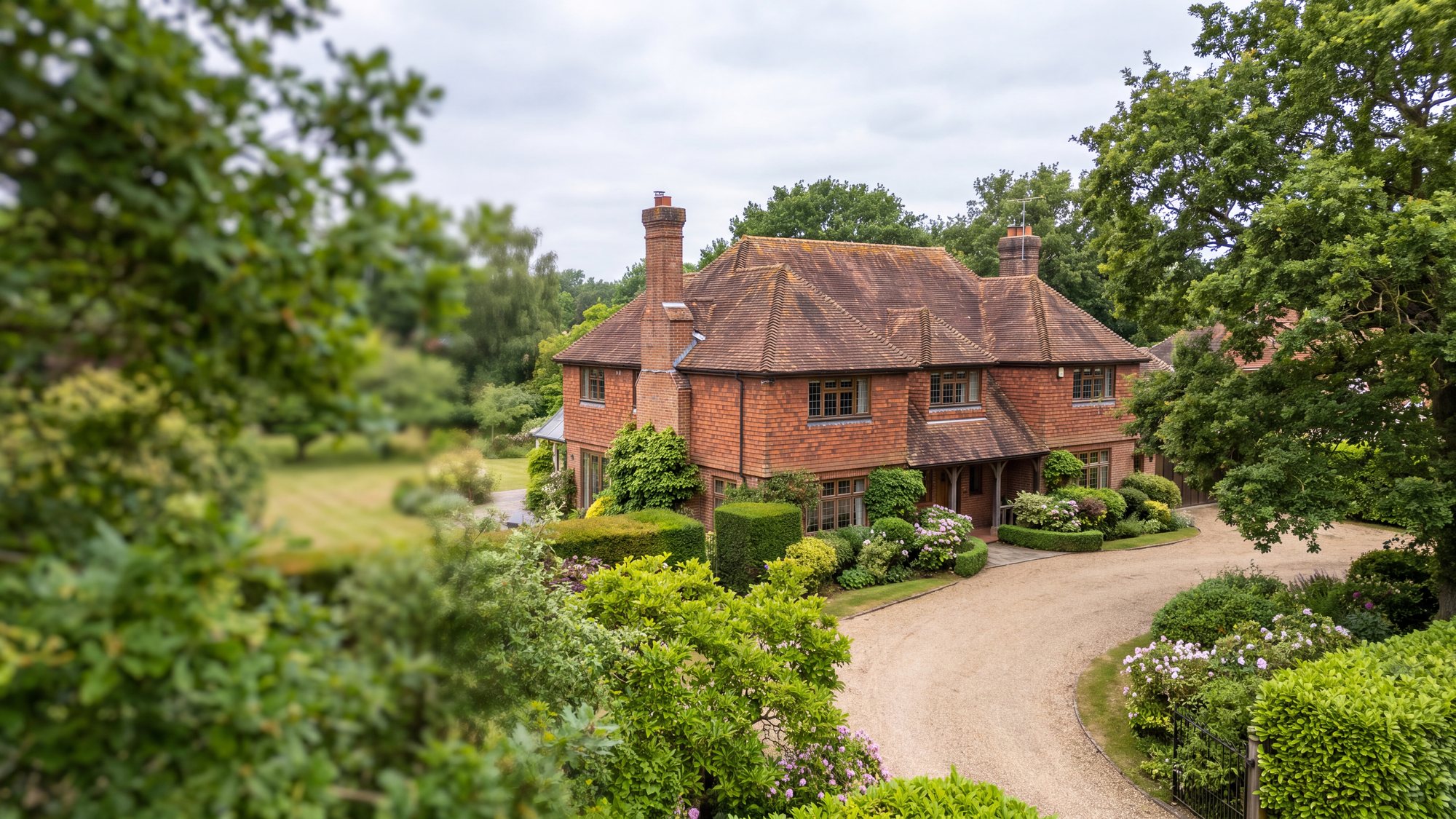 A traditional Surrey detached house with a complete, well finished clay tile roof